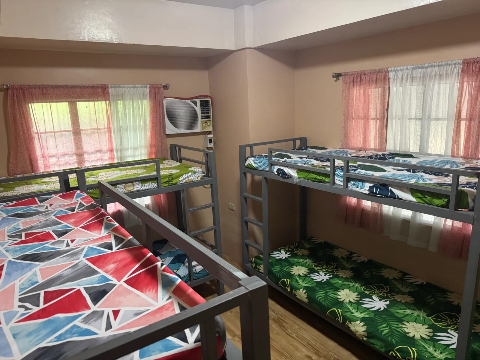 The Barkada Bunk Room with three double-deck beds